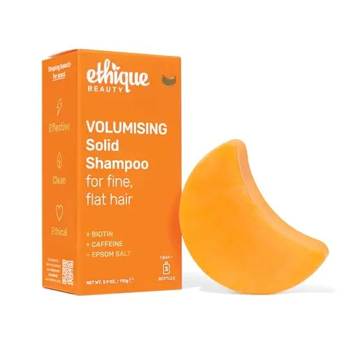 Ethique Volumizing Shampoo Bar with biotin for fine hair on a bamboo dish.